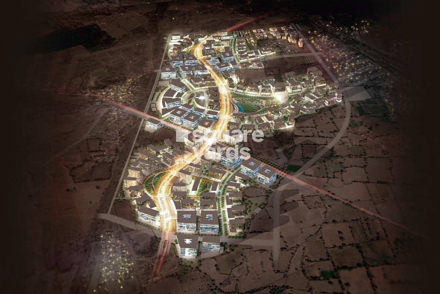 Godrej-Garden-City_an aerial view of a building with a clock on it