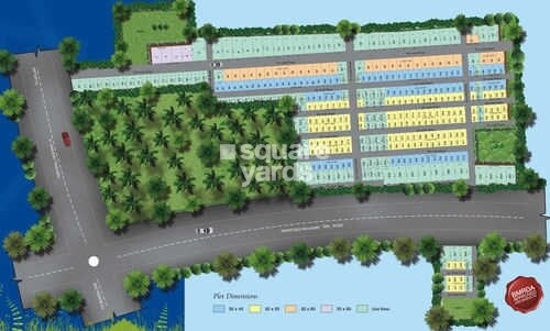 Abhaya-Aditya-Grand-Plot_an aerial view of a park filled with lots of green grass
