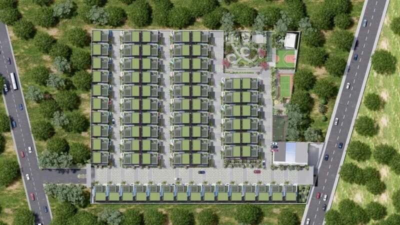 Arsh-Greens_a large building with a lot of green grass