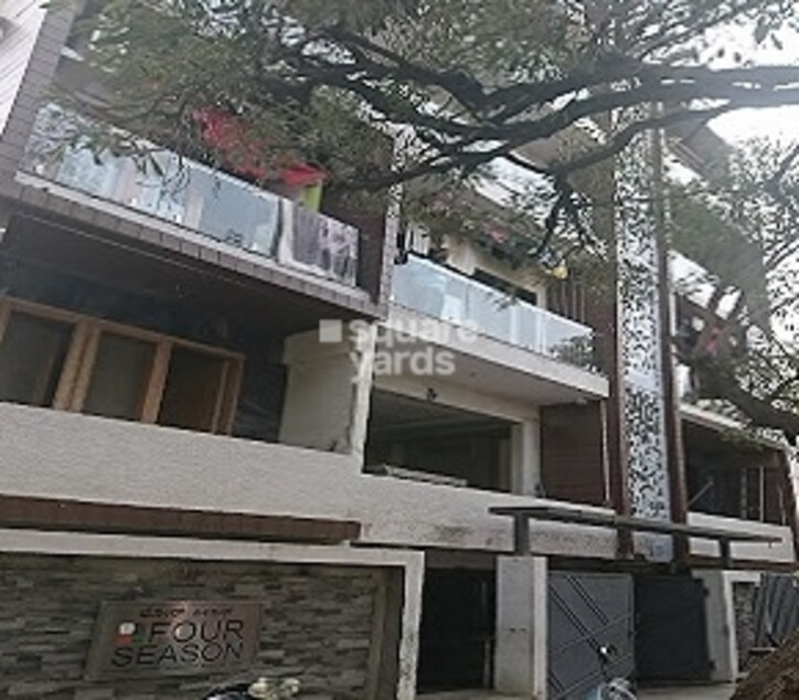 Four Season Apartments Cover Image