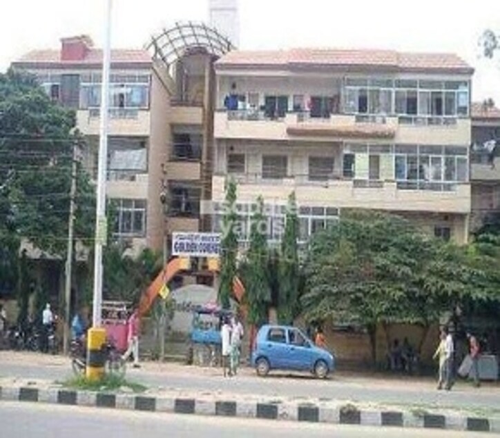 Golden Corner Apartment Cover Image