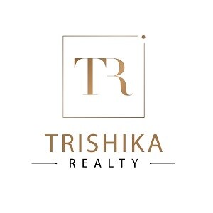 Trishika Realty Logo
