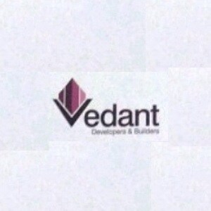 Vedant Developers And Builders Logo