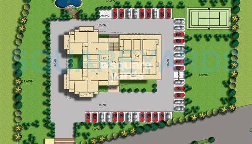 amr-krishna-apartment_an aerial view of a building with a train on top of it