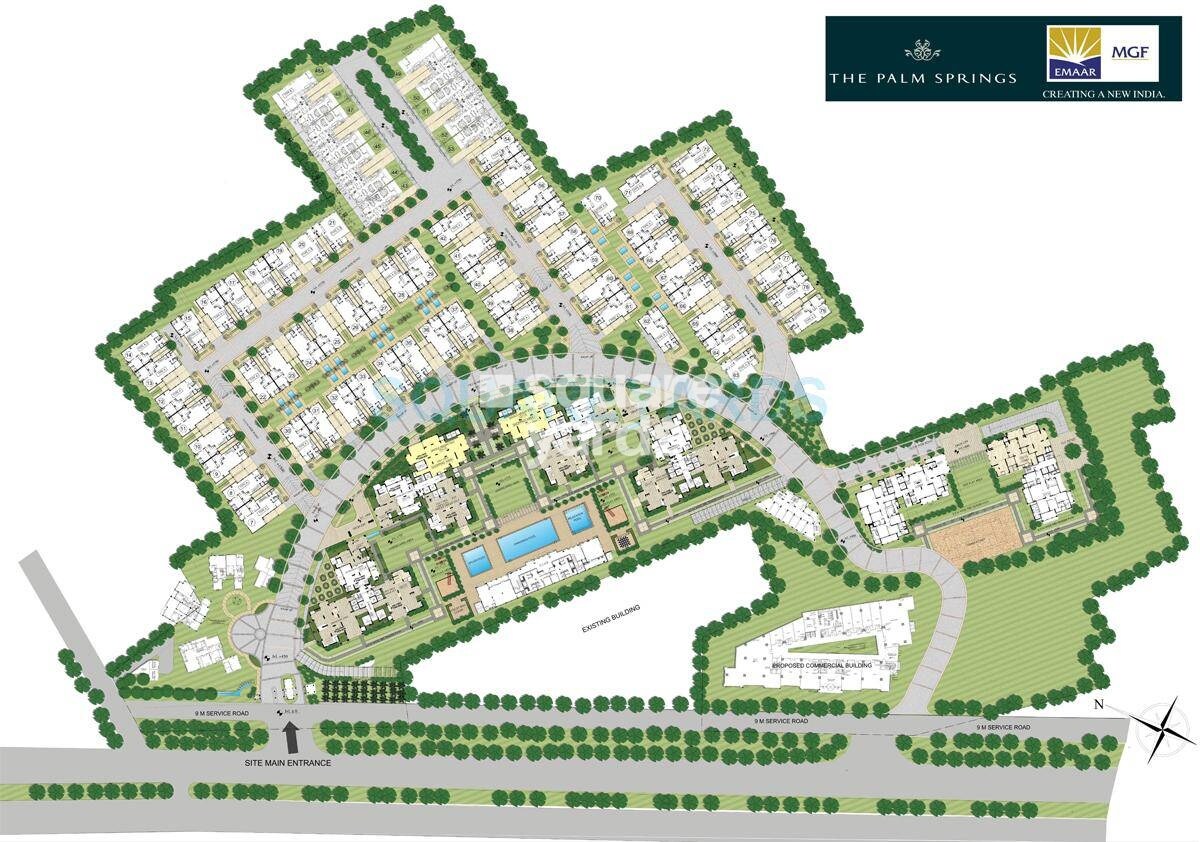 emaar-the-palm-springs_an aerial view of a city with a train on it