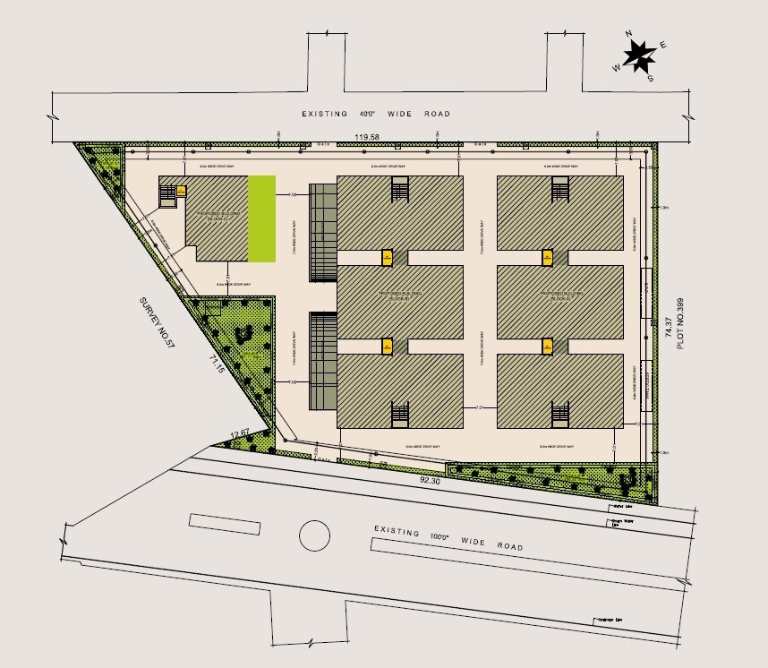 Shwasa-Residency_an aerial view of a building with a train on top of it