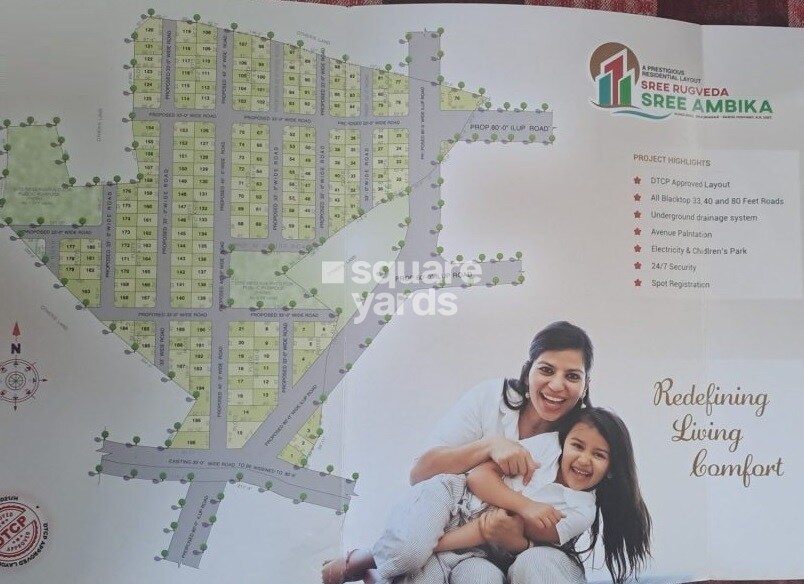 Sree-Rugveda-Sree-Ambika_a poster of a woman holding a teddy bear
