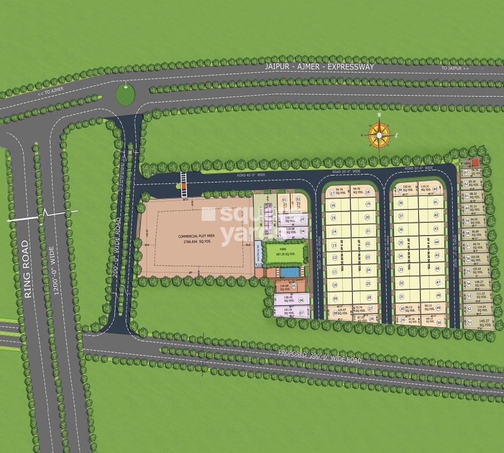 KBR-Ramaa-Enclave_an aerial view of a grassy area with a green field