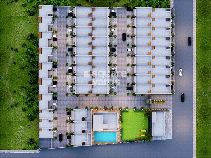 One-Realty-Space-Villas_an aerial view of a field of grass and trees