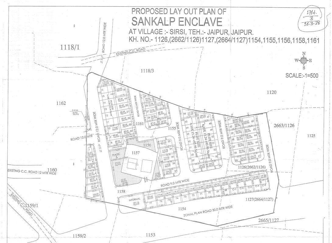 Sankalp-Enclave_a paper that is on top of a table
