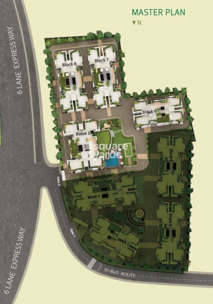 Freshia-Apartments_an aerial view of a small town with a plane flying over it