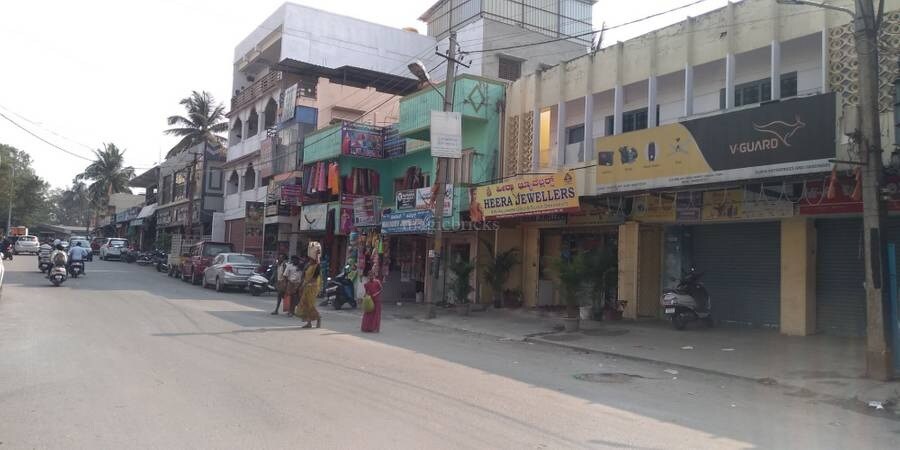 Anekal_a street filled with lots of parked cars