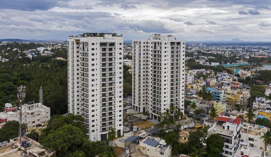 Basavanagudi_a city with tall buildings and a sky background