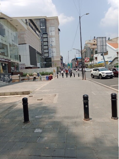 Brigade Road_a street scene with people walking on the sidewalk