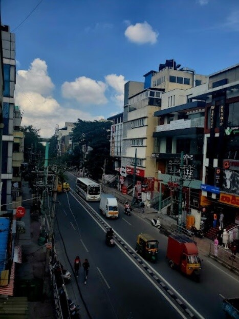BTM Layout_a city street filled with lots of traffic