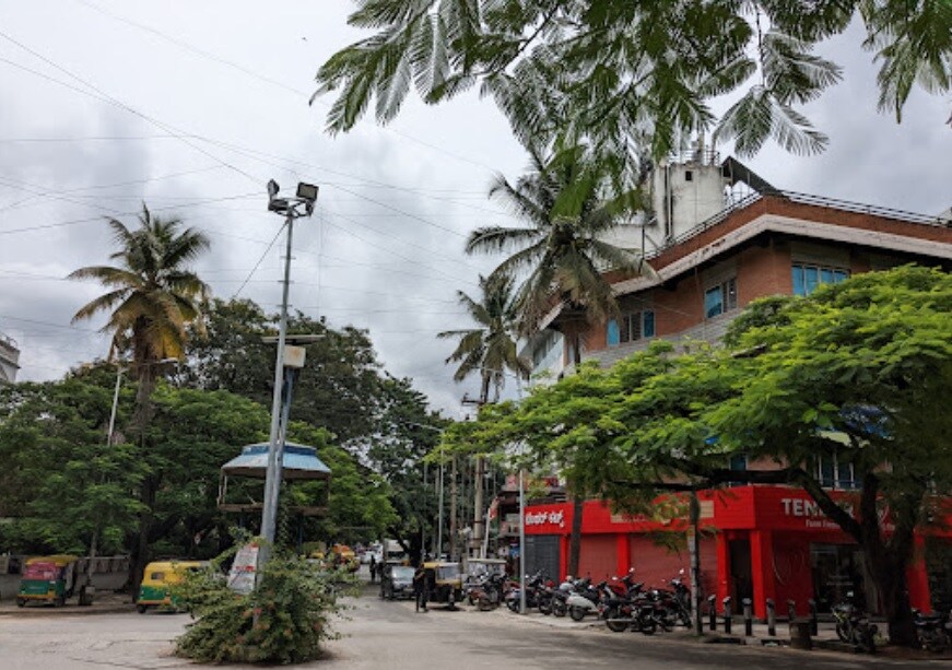 Defence Colony_motorcycles parked in front of a building