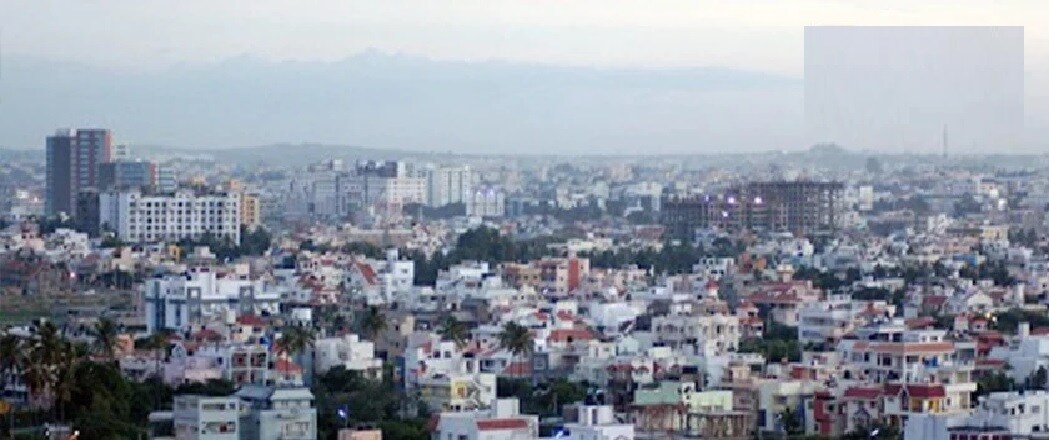 HSR layout_a city with lots of tall buildings and a sky background