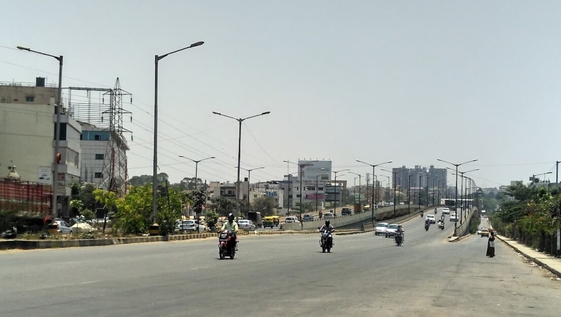 Kalyan Nagar_motorcycles driving down a city street