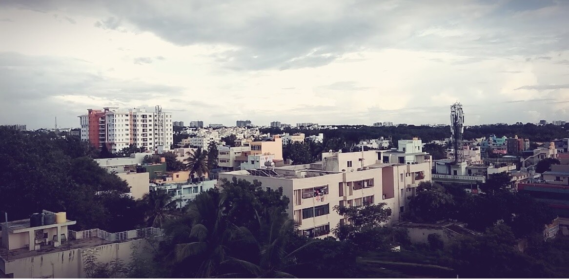 Maruthi Nagar_a city with tall buildings and a sky background