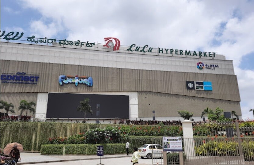 Rajaji Nagar_a large building with a billboard on the side of it
