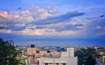 RT Nagar_a city skyline with a sky background