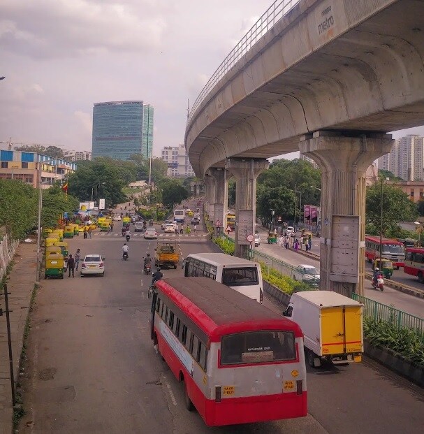 Yeshwanthpur_a double decker bus driving down a city street