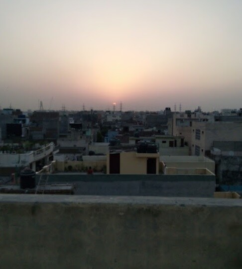 Bhajanpura_a large building with a sky background