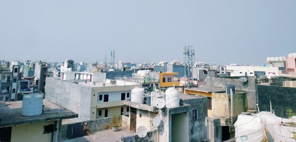 Burari_a large building with a lot of windows on top of it