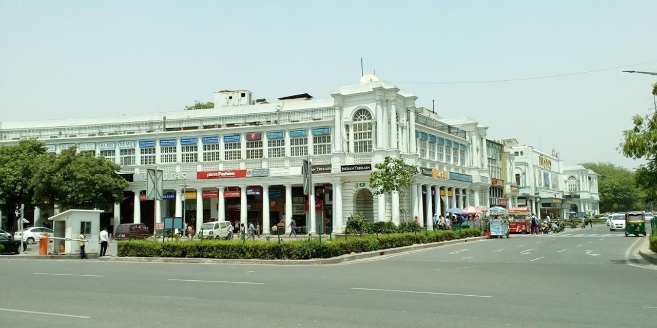 Connaught Place_a large building on the corner of a street