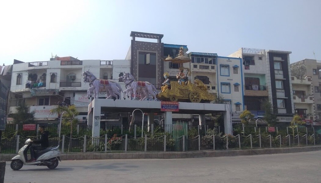 Geeta Colony_a motorcycle parked on the side of a road