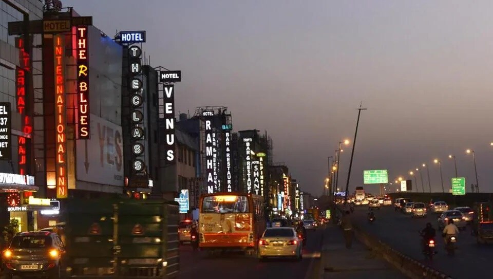 Mahipalpur_a city street filled with traffic at night
