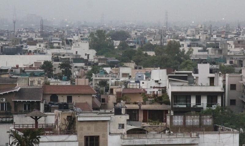 New Friends Colony_a city with lots of buildings and a sky background