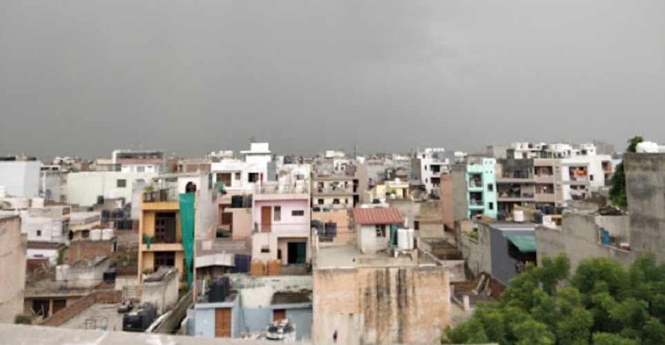 Palam Vihar_a large building with a lot of windows