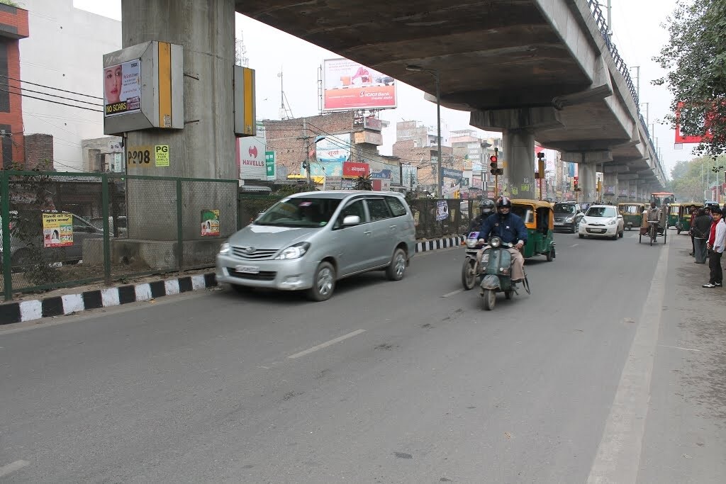 Patel Nagar_motorcycles are parked on the side of the road