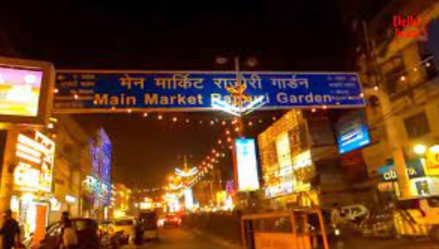 Rajouri Garden_a street sign on the side of a building