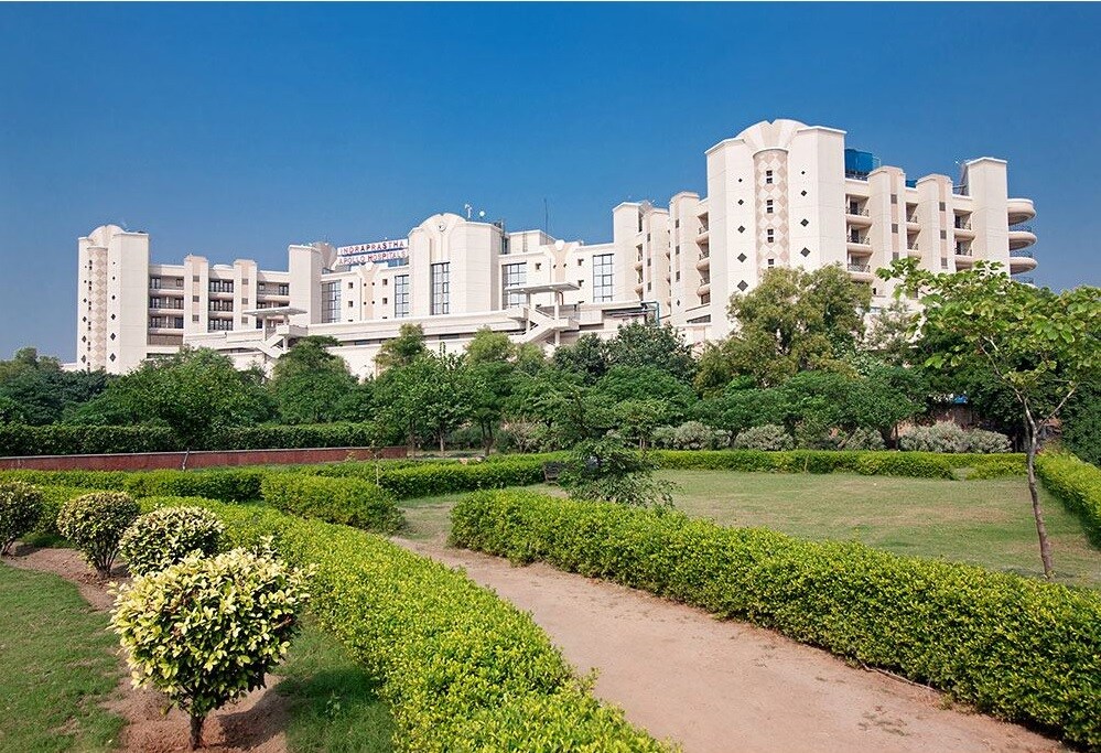 Sarita Vihar_a park filled with lots of green grass and trees