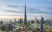 Downtown Dubai_a city with tall buildings and a clock tower