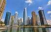 Jumeirah Lake Towers (JLT)_a city with tall buildings and a river