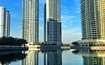 Jumeirah Lake Towers (JLT)_a city with tall buildings and a river