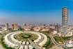 Jumeirah Village Circle (JVC)_a cityscape of a large city with tall buildings