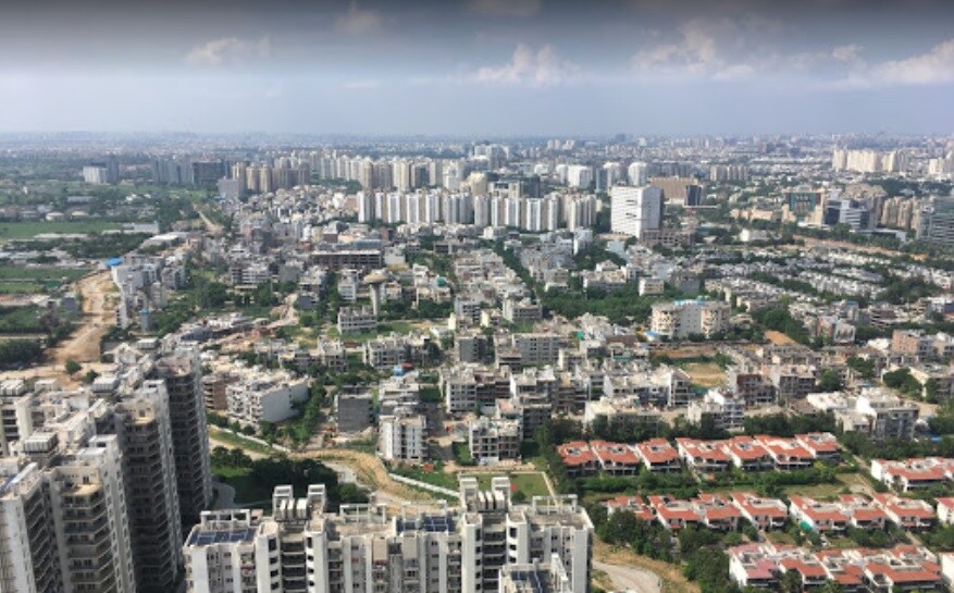 Dhani_a cityscape of a city with tall buildings