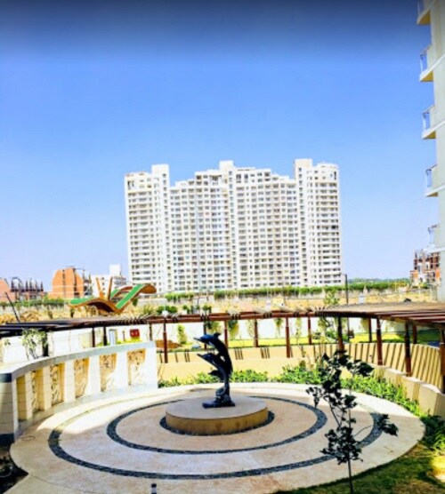 Dharampur_a large building with a fountain in the middle of it