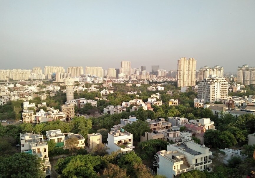 Rajiv Nagar_a city with lots of tall buildings and trees