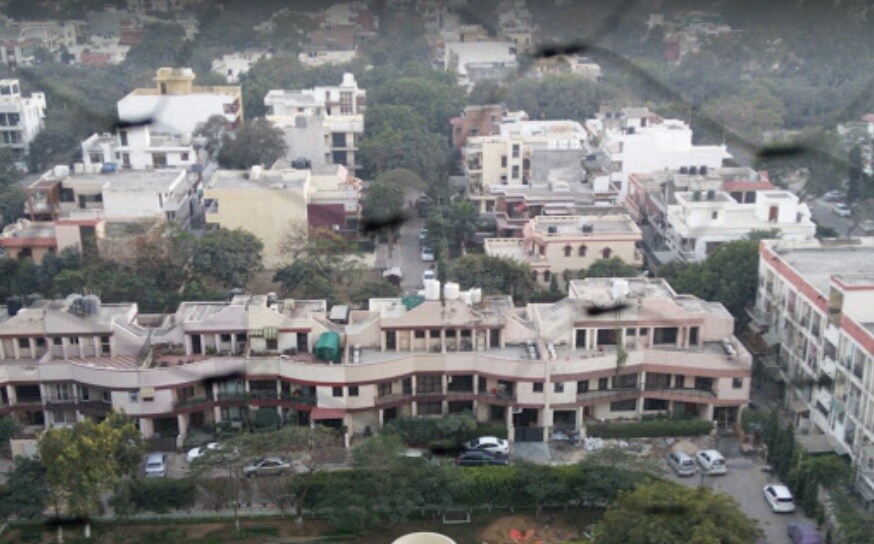 Sector 2_a cityscape of a city with buildings and trees