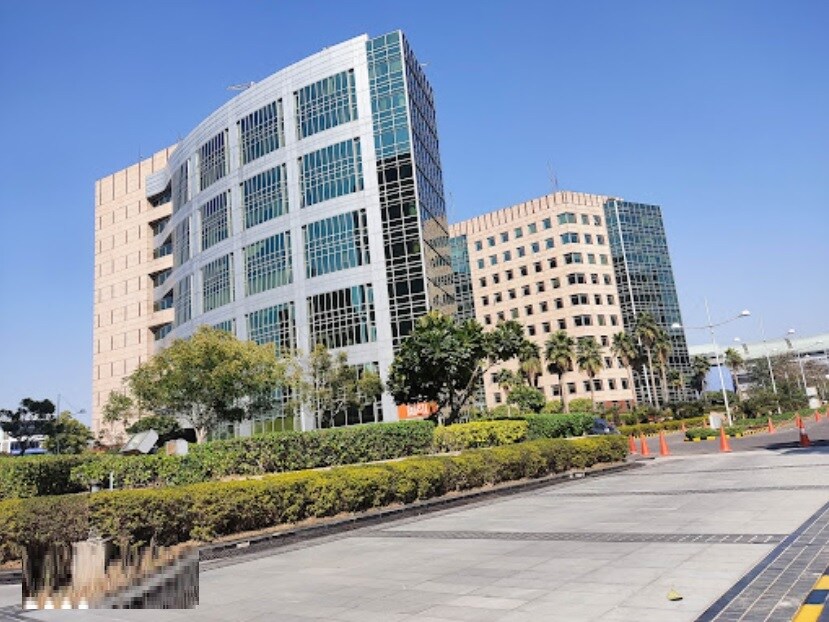 Sector 26_a large building with a lot of windows