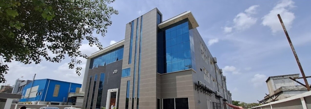 Sector 37_a large building with a clock on the front of it