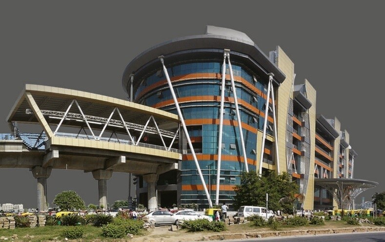 Sector 40_a large building with a clock on top of it