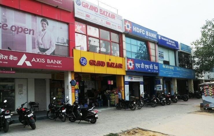 Sector 40_motorcycles parked in front of a store