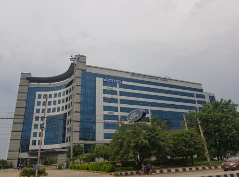 Sector 48_a large building with a large clock on it