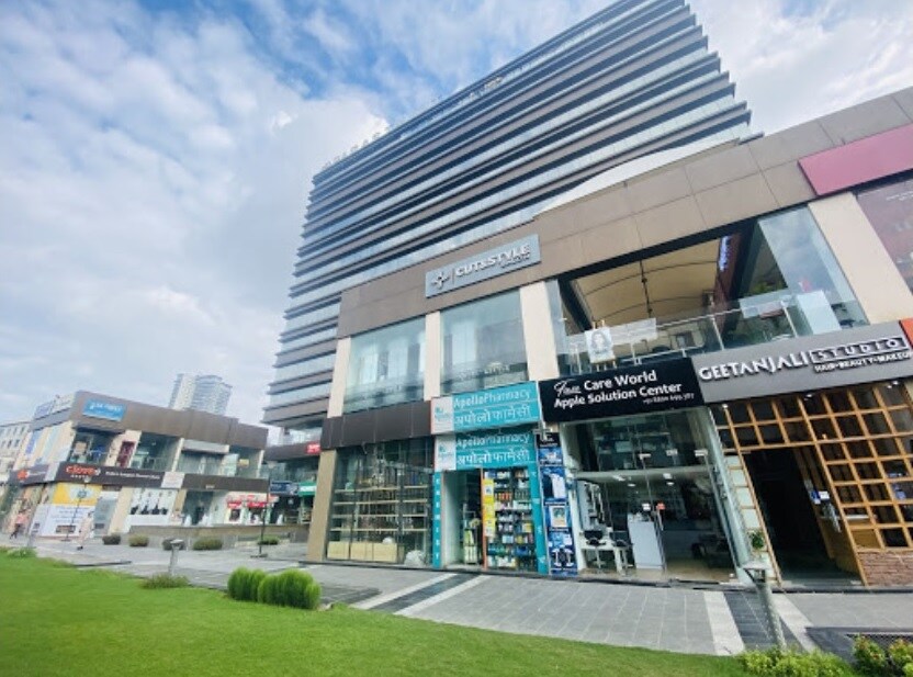 Sector 63_a large building with a lot of windows